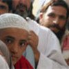 Afghans line up  to collect registration cards