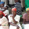 Women wait patiently for their ration