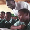 Paul Tergat with school children in Kenya