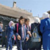 Iraqi refugees join Syrian children for the first day of school