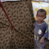 Somali boy in his family's shelter in Afgooye