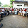 Council members in a meeting in Dili