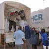 UN staff load trucks with aid destined for  displaced people in Nairobi,  western Kenya