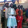 Children wait in a barn on the outskirts of Eldoret town after being forced to flee their homes