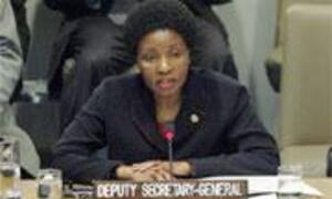 Deputy Secretary-General Asha-Rose Migiro speaks at a podium during a UN Security Council meeting in New York.