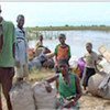 Evacuees rescued by boats along the Zambezi River Valley