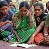 Girls learn to read in Bubel village in Orissa, India