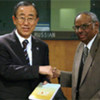 Professor C. Rangarajan (right) presents  report of the Commission on AIDS in Asia to  Ban Ki-Moon