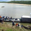 Ferry laden with vital food aid for indigenous people on the Guaviare River