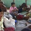 Cyclone-affected families take refuge at Leikkukone Pagoda in Pyapon township, Myanmar