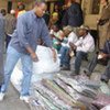 Displaced foreigners offload UNHCR sleeping mats in Germiston