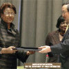 USG Kiyotaka Akasaka presents award to Dame Billie Antoinette Miller
