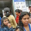 Colombian refugees wait for information and guidance in Ecuador’s northern border region