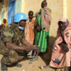 UNAMID peacekeeper talking to local population in Western Darfur (file photo)