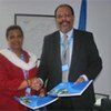 UNHCR's Guenet Guebre-Christos and UNICEF's Martin Mogwanja after signing the MoU on vaccine procurement