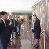 Group visitors on tour at UN Headquarters in front of the Zanetti Mural