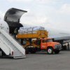 Tents, blankets, other urgent supplies being unloaded from UN-chartered cargo plane