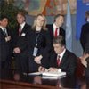 President Victor Yushchenko of Ukraine signs the convention
