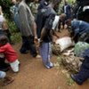 With UN help, Liberian police stop and search a car suspected of carrying drugs