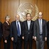 Secretary-General Ban Ki-moon (4th left) poses for a group photo with world economists