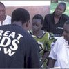 A health worker counselling women about HIV/AIDS treatment