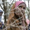 A refugee child looks out from one of the three overcrowded camps in Dadaab, Kenya