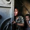 Palestinian children cower in fear during Israeli military offensive in Gaza