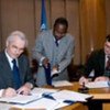 Bertrand Hervieu of CIHEAM (left) and FAO's Hervé Lejeune (right) sign agreement