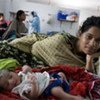 A healthy mother with her  newborn in India