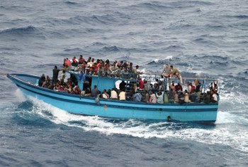 A boat carrying asylum seekers and migrants in the Mediterranean Sea.