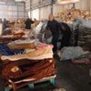 UNRWA staff in the West Bank Field Office pack blankets for Gaza