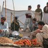 Small businesses have sprouted as displaced Pakistanis try to make a living in Katcha Garhi camp