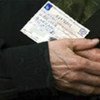 An Iraqi woman obtains a vote card. [File Photo]