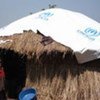 Une hutte de déplacés en Ouganda