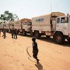 A UNHCR convoy carrying Sudanese refugees stops for a break on the way to South Sudan