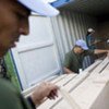 UN peacekeepers in Haiti load container with electoral material for the 19 April election