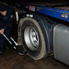 An inspector checks vehicle transporting highly enriched uranium across the border from the Czech Republic