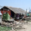 One year after Cyclone Nargis, more than 500,000 people, including 200,000 children, are still living in makeshift shelters
