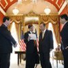 Secretary-General Ban Ki-moon (second from right) confers with the members of his delegation in Washington on 21 May 2009