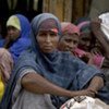 A group of Somali women forced to flee their homes sit and ponder their future