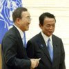 Secretary-General Ban Ki-moon (left) and Prime Minister Taro Aso of Japan hold a press encounter