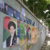 Images of candidates for Afghanistan's 20 August 2009 elections plastered on a wall in Kabul