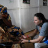 Goodwill Ambassador Osvaldo Laport talks to displaced Congolese women at a clinic in North Kivu during his recent visit