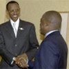 Presidents Joseph Kabila (right) and Paul Kagame shake hands at Durban meeting in 2002