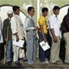 Afghans queue up to vote in the presidential and provincial council elections