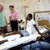 UN Special Envoy Bill Clinton (left) touring a hospital in Haiti during his visit on 9 July 2009