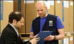 WHO staff prepare boxes of antiviral drugs to treat the H1N1 virus for dispatch to countries [File Photo]