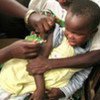 A child being vaccinated against measles