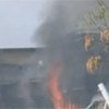 The guest house in Kabul where UN staff stayed, ablaze after it was attacked on 28 October 2009