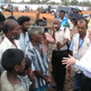 UN Emergency Relief Coordinator John Holmes (right) speaking with IDPs in Vavuniya, Sri Lanka, on 27 April 2009